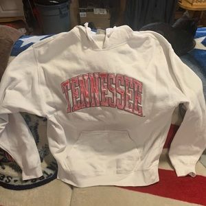 White Tennessee hoodie with pink stitching.